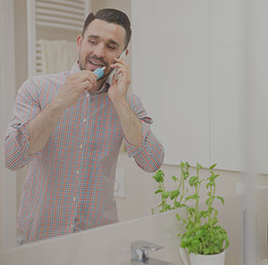 man in bathroom, ignoring audio prompts
